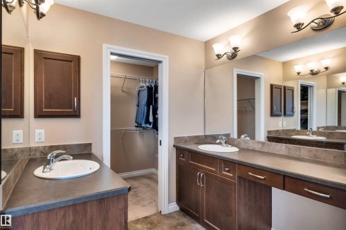 Dual vanity with undermount sinks and chrome faucets - 18 Voleta Crest, Spruce Grove, AB 