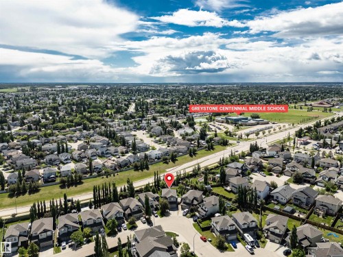 Aerial perspective showcasing a residential area with varied housing styles - 18 Voleta Crest, Spruce Grove, AB 