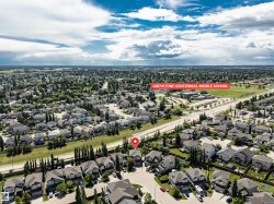 Aerial perspective showcasing a residential area with varied housing styles - 
