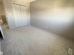 Neutral-toned wall paint with white trim - 