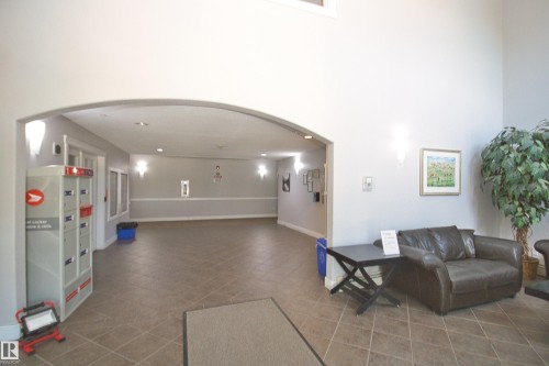 Lobby featuring a towering ceiling - 311 2098 Blackmud Creek Drive, Edmonton, AB 