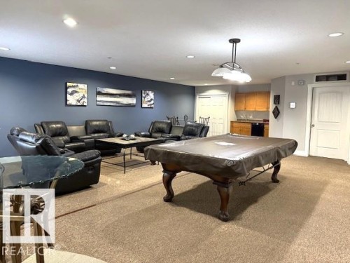 Rec room with light carpet, billiards table, and recessed lighting - 311 2098 Blackmud Creek Drive, Edmonton, AB 