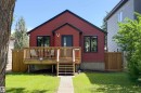 Red siding exterior with black trim windows - 10811 73 Avenue, Edmonton, AB 
