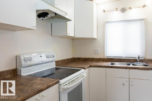 5016 44 Street, Drayton Valley, AB - Indoor Photo Showing Kitchen With Double Sink