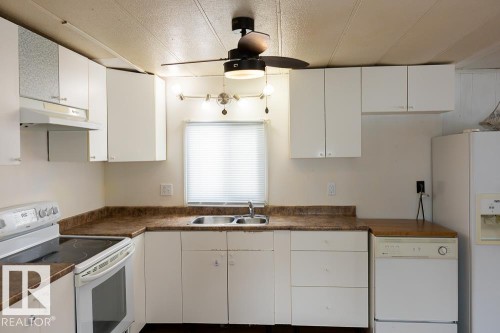 5016 44 Street, Drayton Valley, AB - Indoor Photo Showing Kitchen With Double Sink