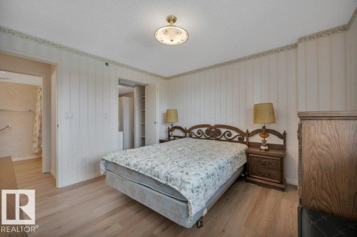 Light wood-finish flooring throughout - 316 2011 137 Avenue, Edmonton, AB - Indoor Photo Showing Bedroom
