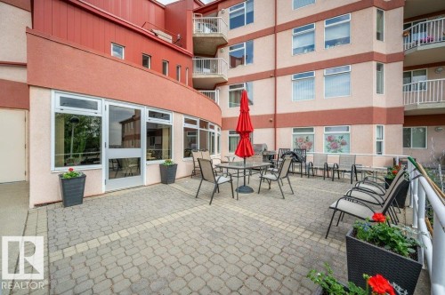 Expansive paver patio offering direct ground-level access to the building - 316 2011 137 Avenue, Edmonton, AB - Outdoor With Balcony With Exterior