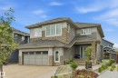 Contemporary two-story residence featuring a combination of siding and stone veneer - 76 Jacobs Close, St. Albert, AB 