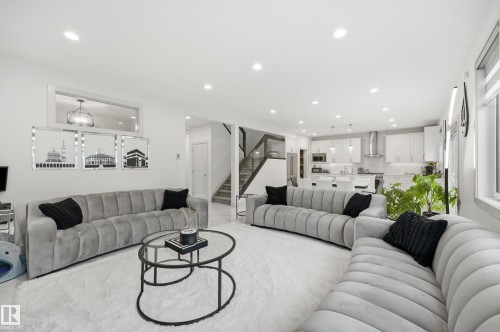 Open-concept living space with recessed lighting and light-toned flooring - 76 Jacobs Close, St. Albert, AB 