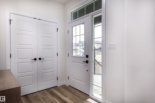 Entryway featuring wood-finish flooring - 519 Ashgrove Circle, Leduc, AB 