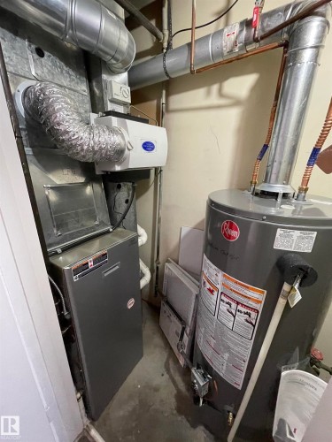 Furnace system with integrated humidifier, copper piping, and hot water heater - 8930B 144 Avenue, Edmonton, AB 