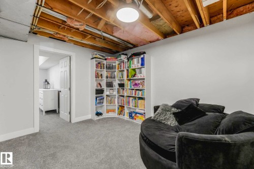 Flex space with built-in bookshelves - 553006 Range Road 153, Rural Two Hills County, AB - Indoor Photo Showing Other Room