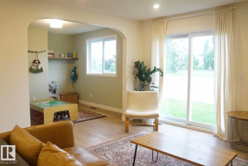 Expansive sliding glass door providing abundant natural light - 25 8930 99 Avenue, Fort Saskatchewan, AB 
