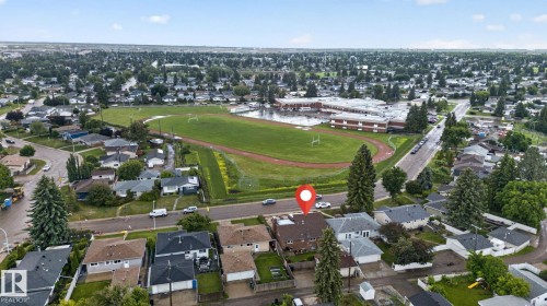 Expansive neighborhood featuring numerous residential properties and mature trees - 5808 Austin O'Brien Road, Edmonton, AB 