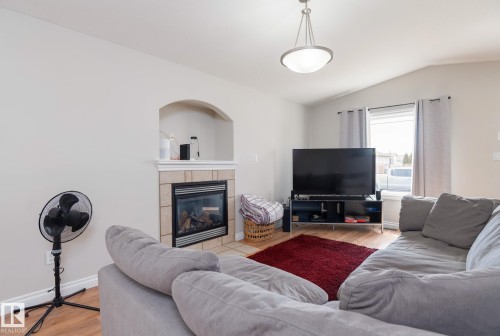 2620 Lake Avenue, Cold Lake, AB - Indoor Photo Showing Living Room With Fireplace