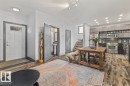 Open concept living space featuring wood-finish flooring - 3 7210 96 Street, Edmonton, AB  - Indoor 