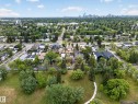 Expansive greenspace with mature trees and paved walking paths - 10809 150 Street, Edmonton, AB 