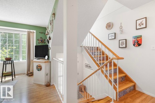 Hardwood flooring throughout the main level - 44 9630 176 Street, Edmonton, AB 