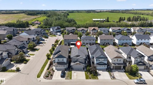 Contemporary two-story residence featuring a gray exterior with white trim - 9432 229 Street, Edmonton, AB 
