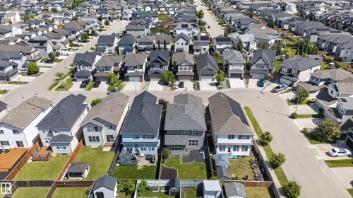 Aerial perspective of a residential community featuring multiple detached homes with varying architectural styles - 9432 229 Street, Edmonton, AB 