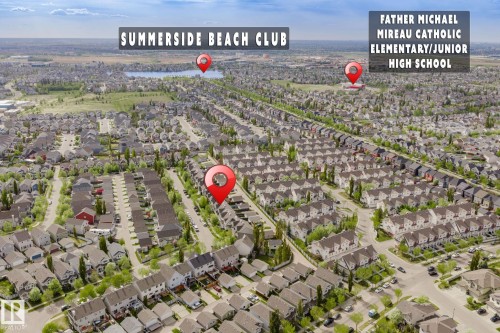 Aerial perspective showcasing a residential community with numerous detached homes and green spaces - 7118 19A, Edmonton, AB - Outdoor With View