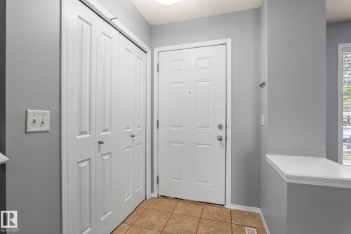 Entryway featuring light gray wall paint and white trim - 7118 19A, Edmonton, AB - Indoor Photo Showing Other Room