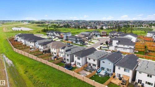 Residential development featuring a variety of detached homes with fenced backyards - 3173 Checknita Way, Edmonton, AB 
