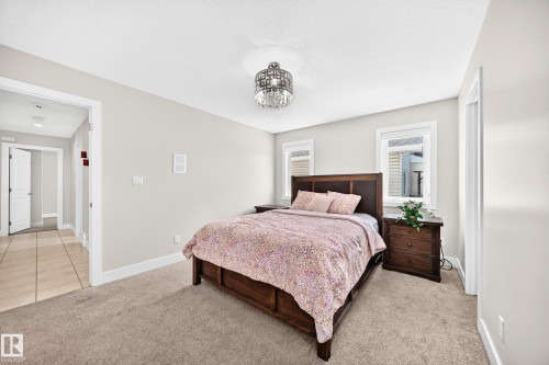 Bedroom with neutral wall color and carpeted flooring - 16124 76 Street, Edmonton, AB 