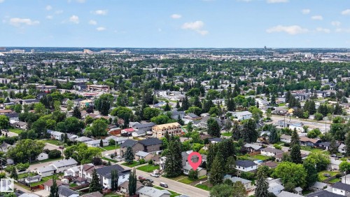 Expansive residential area with numerous mature trees and visible neighborhood infrastructure - 10924 154 Street, Edmonton, AB 