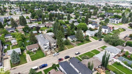 Aerial perspective showcasing a residential area with mature trees and established properties - 10924 154 Street, Edmonton, AB 