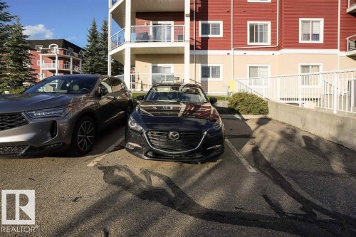 Image quality insufficient for description - #117 226 Macewan Sw, Edmonton, AB - Outdoor