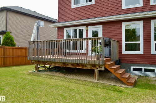 Expansive wooden deck with coordinating railings and stairs - 1 Hemlock Close, Fort Saskatchewan, AB 
