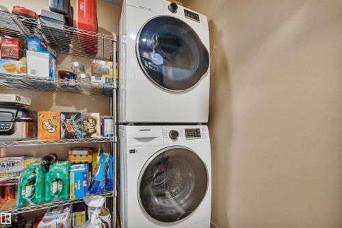 Stackable laundry machines provide efficient utility - 305 5212 48 Avenue, Wetaskiwin, AB 