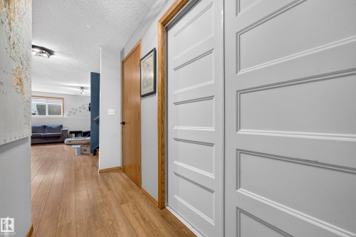 White paneled doors with wood trim - 1 Primrose Boulevard, Sherwood Park, AB 