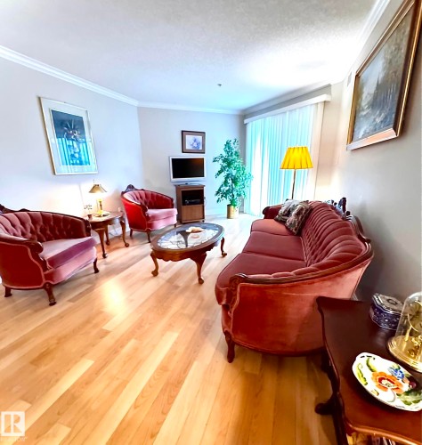 Light wood-finish flooring throughout - 330 13111 140 Avenue, Edmonton, AB 
