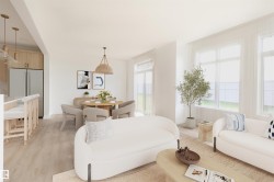 Open-concept living space featuring wood-finish flooring, recessed lighting, and expansive windows - 