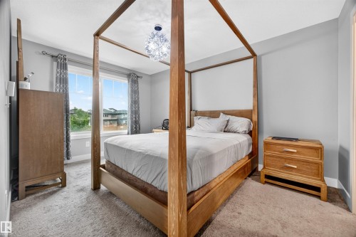 Bedroom featuring light gray wall paint and plush carpeting - 1603 158 Street, Edmonton, AB 