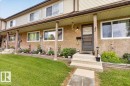Townhome exterior featuring stucco and siding finishes - 27 Walden Park, St. Albert, AB 