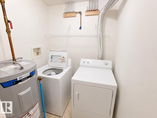 #A 4923 49 St, Gibbons, AB - Indoor Photo Showing Laundry Room