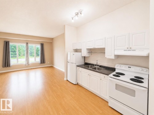 #A 4923 49 St, Gibbons, AB - Indoor Photo Showing Kitchen With Double Sink