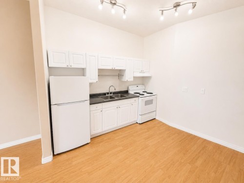 #A 4923 49 St, Gibbons, AB - Indoor Photo Showing Kitchen With Double Sink