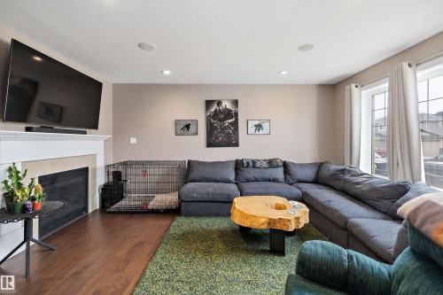 102 Richmond Link, Fort Saskatchewan, AB - Indoor Photo Showing Living Room With Fireplace
