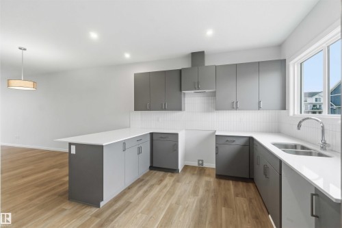 1088 Mcleod Avenue, Spruce Grove, AB - Indoor Photo Showing Kitchen With Double Sink