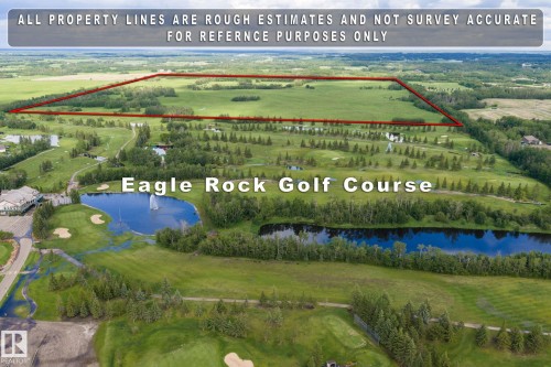 Expansive undeveloped land bordered by mature trees and open fields - 23327 Twp Rd 510, Rural Leduc County, AB 