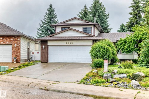 Two-story residence featuring white siding and brown trim - 9843 188 Street, Edmonton, AB 