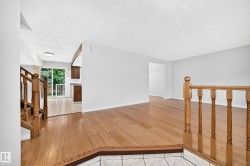 Hardwood flooring throughout the main living area - 