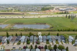 Residential property situated within a developed neighborhood, featuring a structured street grid - 