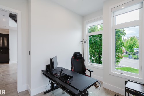 Dedicated room with two large windows and wood-finish flooring - 1313 Clement Crest, Edmonton, AB 