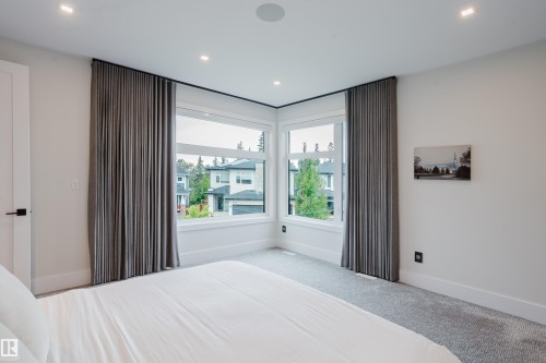 Corner window configuration with full-height drapes - 1313 Clement Crest, Edmonton, AB 