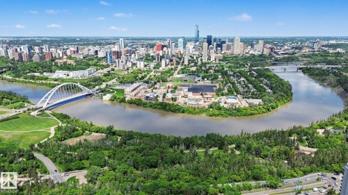Panoramic aerial showcasing a major river winding through a vibrant urban landscape - 413 10116 80 Avenue, Edmonton, AB 